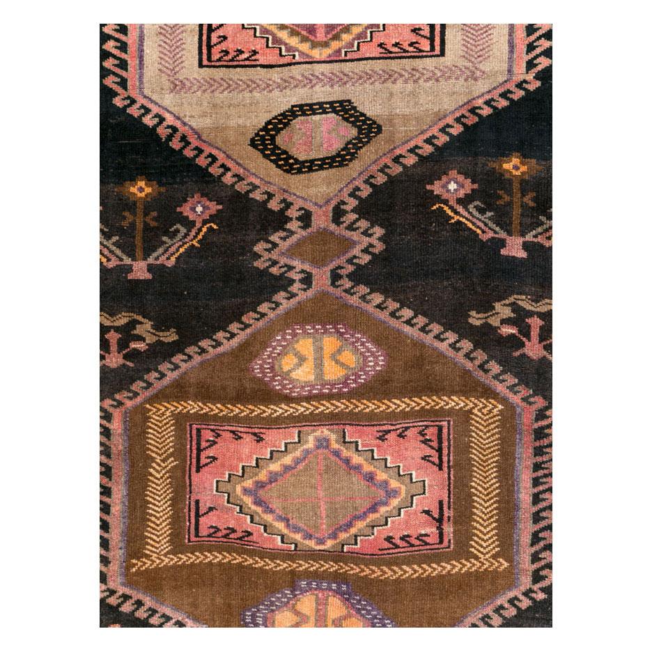 A vintage Turkish Anatolian tribal room size carpet handmade during the mid-20th century.

Measures: 7' 11