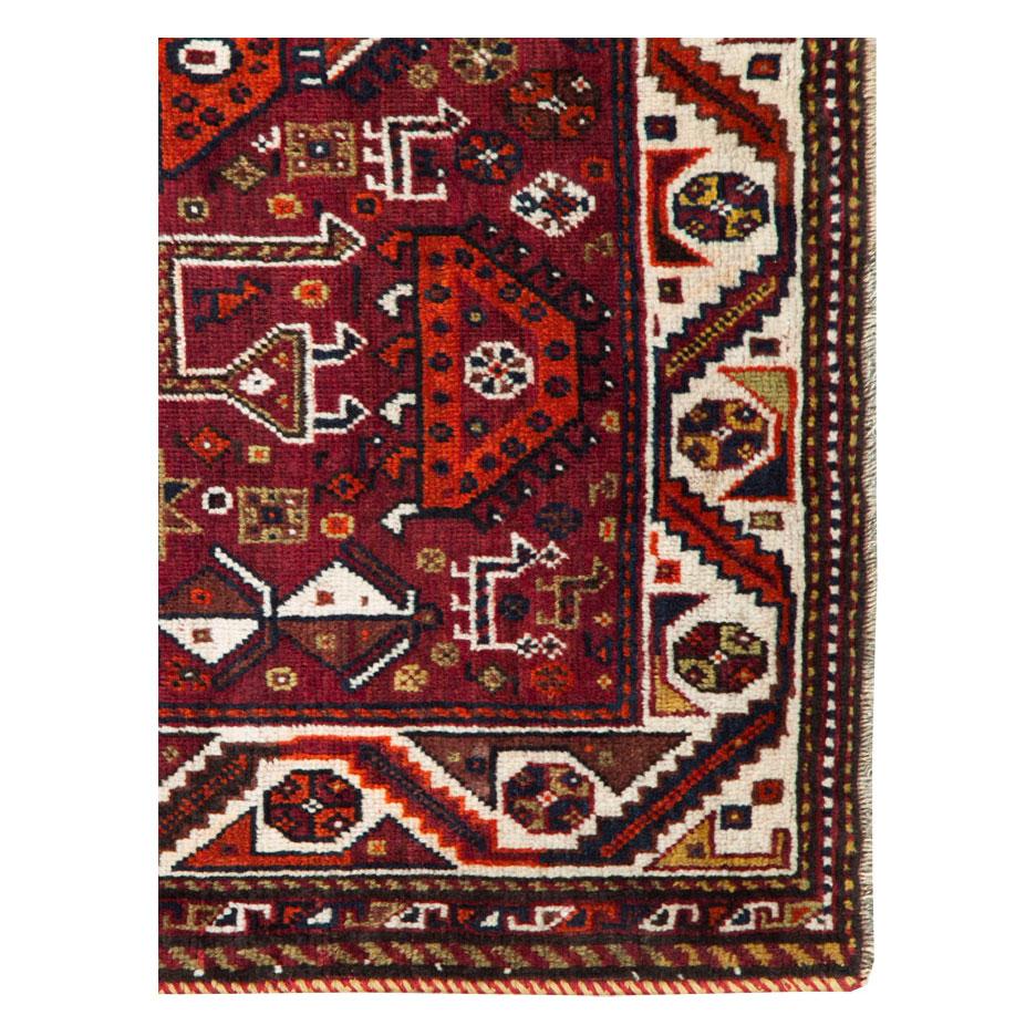 Hand-Knotted Tribal Mid-20th Century Persian Qashqai Pictorial Lion Accent Rug in Burgundy For Sale