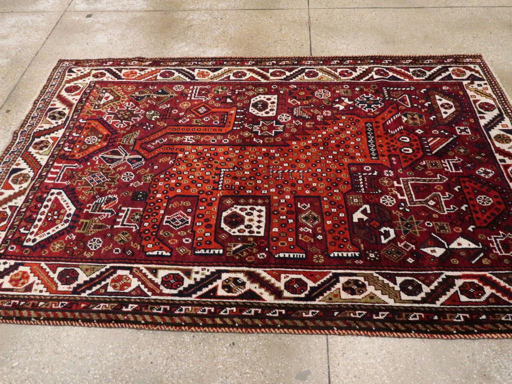 Tribal Mid-20th Century Persian Qashqai Pictorial Lion Accent Rug in Burgundy In Excellent Condition For Sale In New York, NY