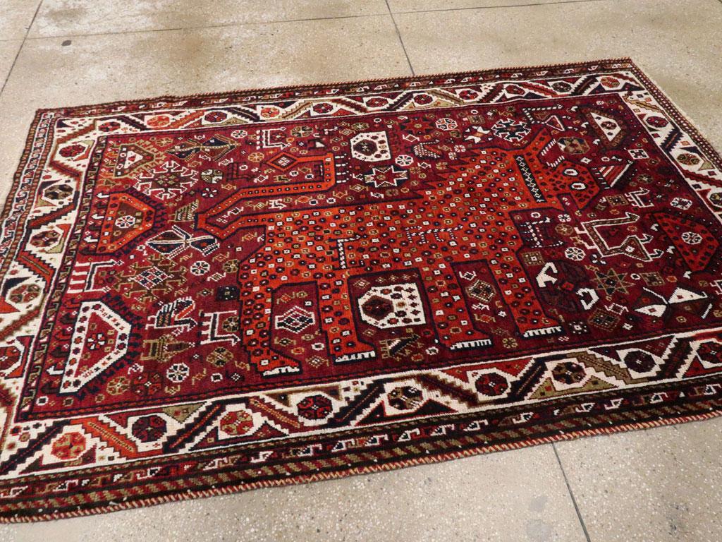 Wool Tribal Mid-20th Century Persian Qashqai Pictorial Lion Accent Rug in Burgundy For Sale