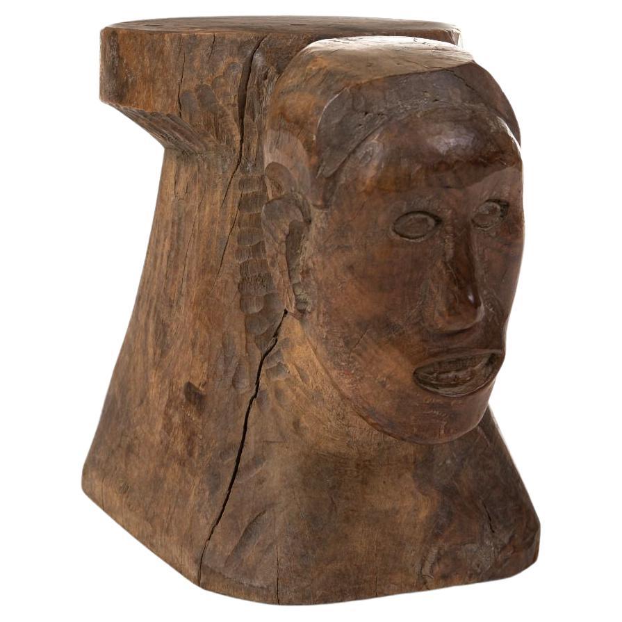 Taburete Tribal de Madera de Molave con Cabeza Masculina Tallada en venta