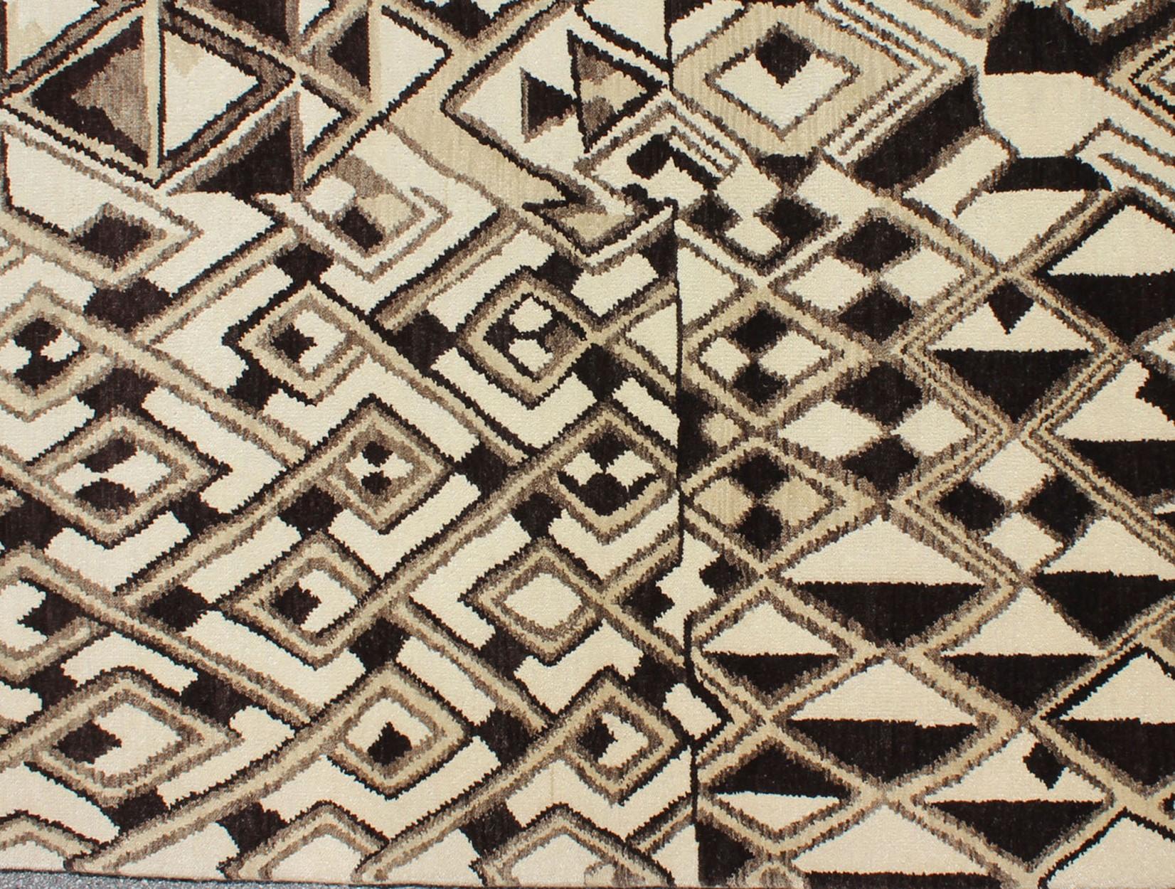 Tribal Moroccan rug, rug OB-9261577-527008, country of origin / type: India / Moroccan, circa Early-21st Century.

Measures: 6'0 x 9'0.

This stunning hand-woven rug features an All-Over Abstract Geometric design makes a great fit for a wide variety