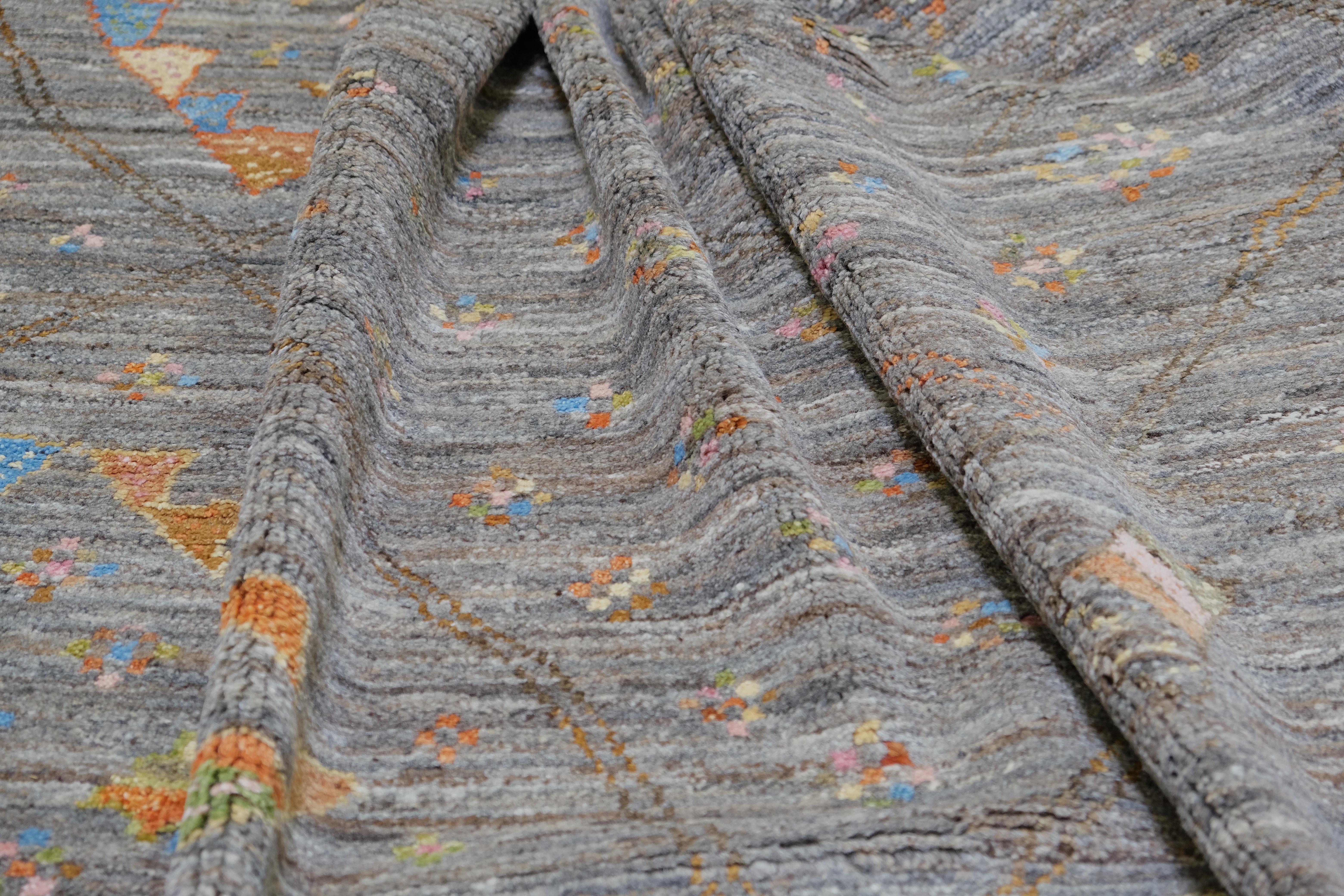 Alfombra de lana con motivos tribales 10'6''x14'3'' Anudado a mano en venta