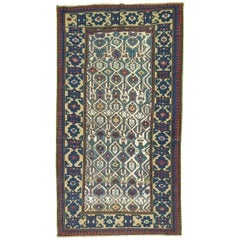 Tapis caucasien Kuba tribal bleu marine et vert foncé