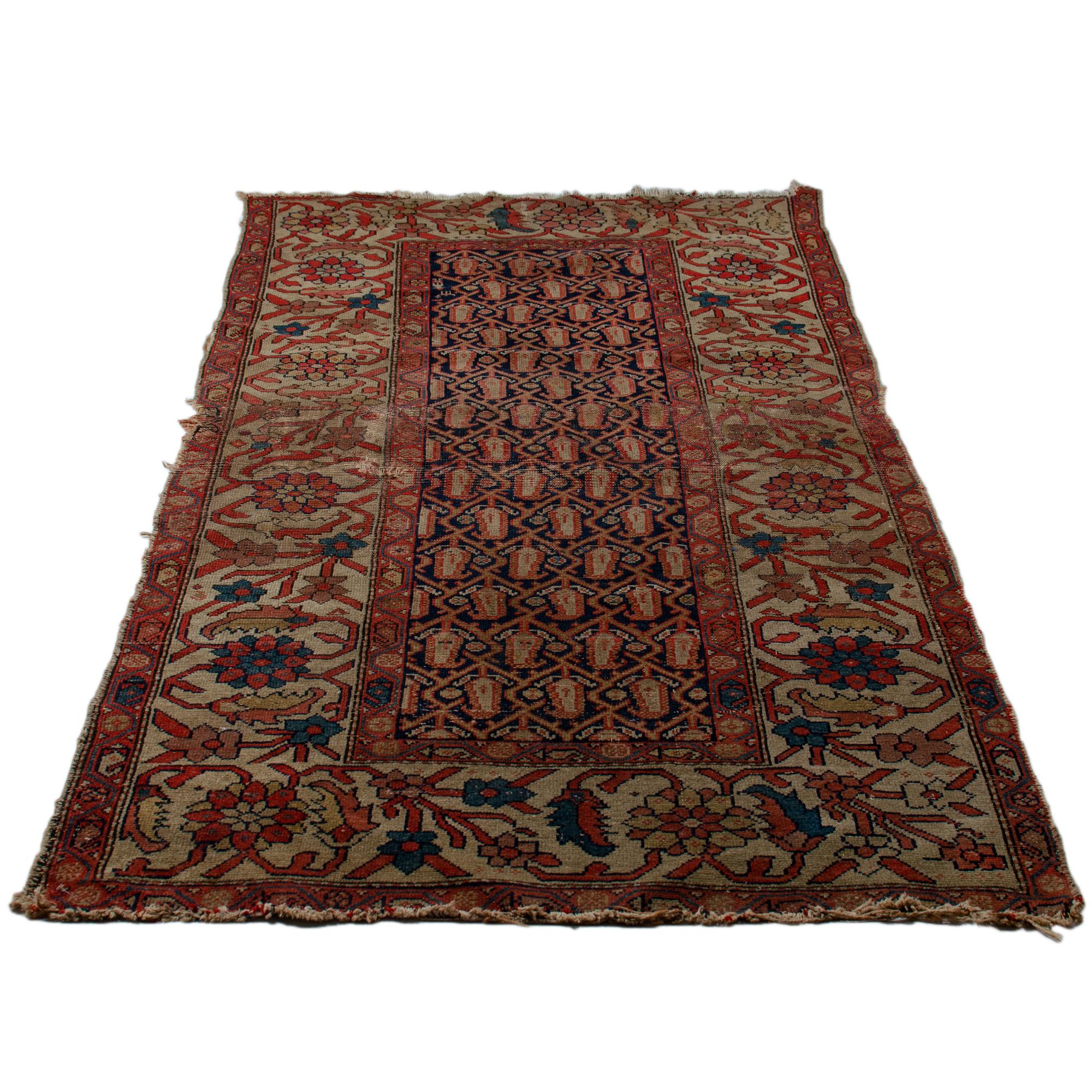 A tribal Northwest Persian rug, late 19th century.

3’10.5” by 7’7