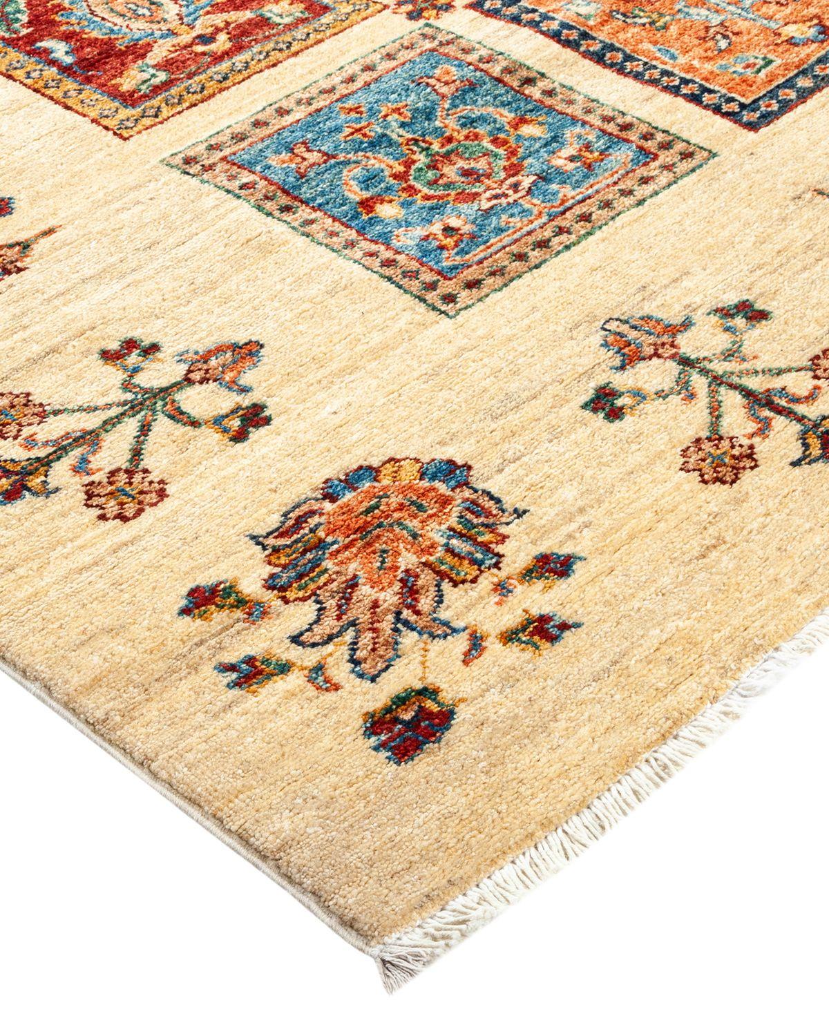 The rich textile tradition of western Africa inspired the Tribal collection of hand-knotted rugs. Incorporating a medley of geometric motifs, in palettes ranging from earthy to vivacious, these rugs bring a sense of energy as well as plush texture