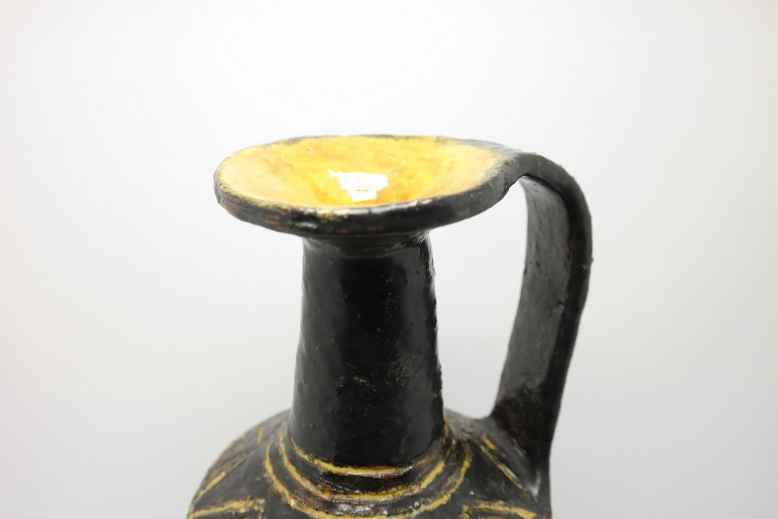 Tribal patterned, jug handle ceramic vase by Lendvay. Small chip on the side as on photos.