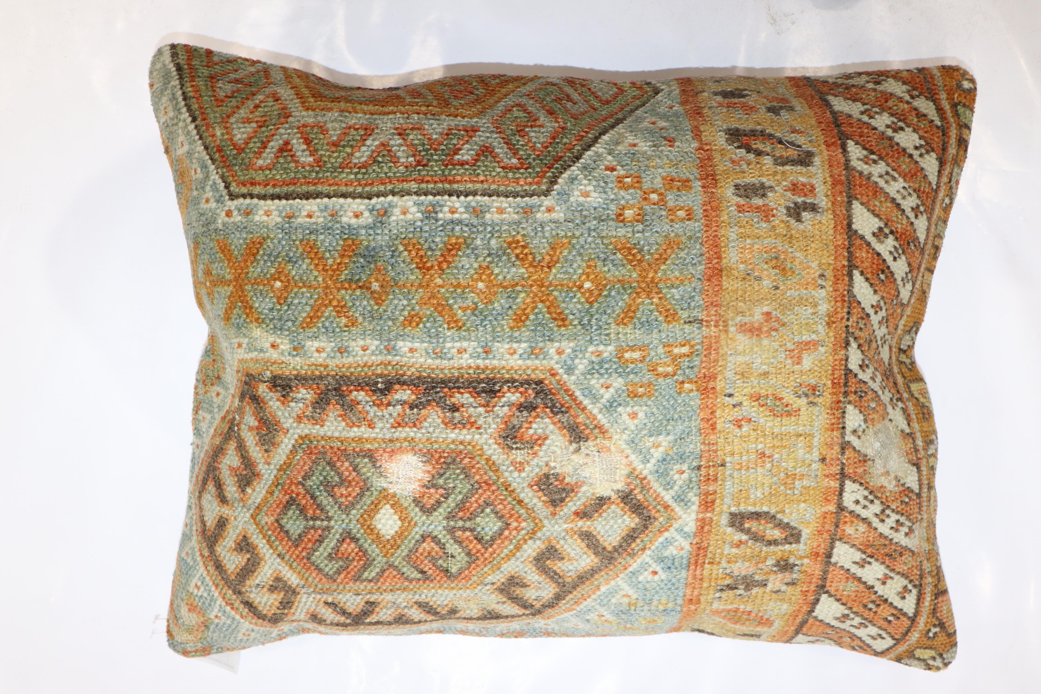 Large-size pillow made from a Persian Kurd rug. zipper closure and poly-fill insert provided.

Measures: 18'' x 23''.