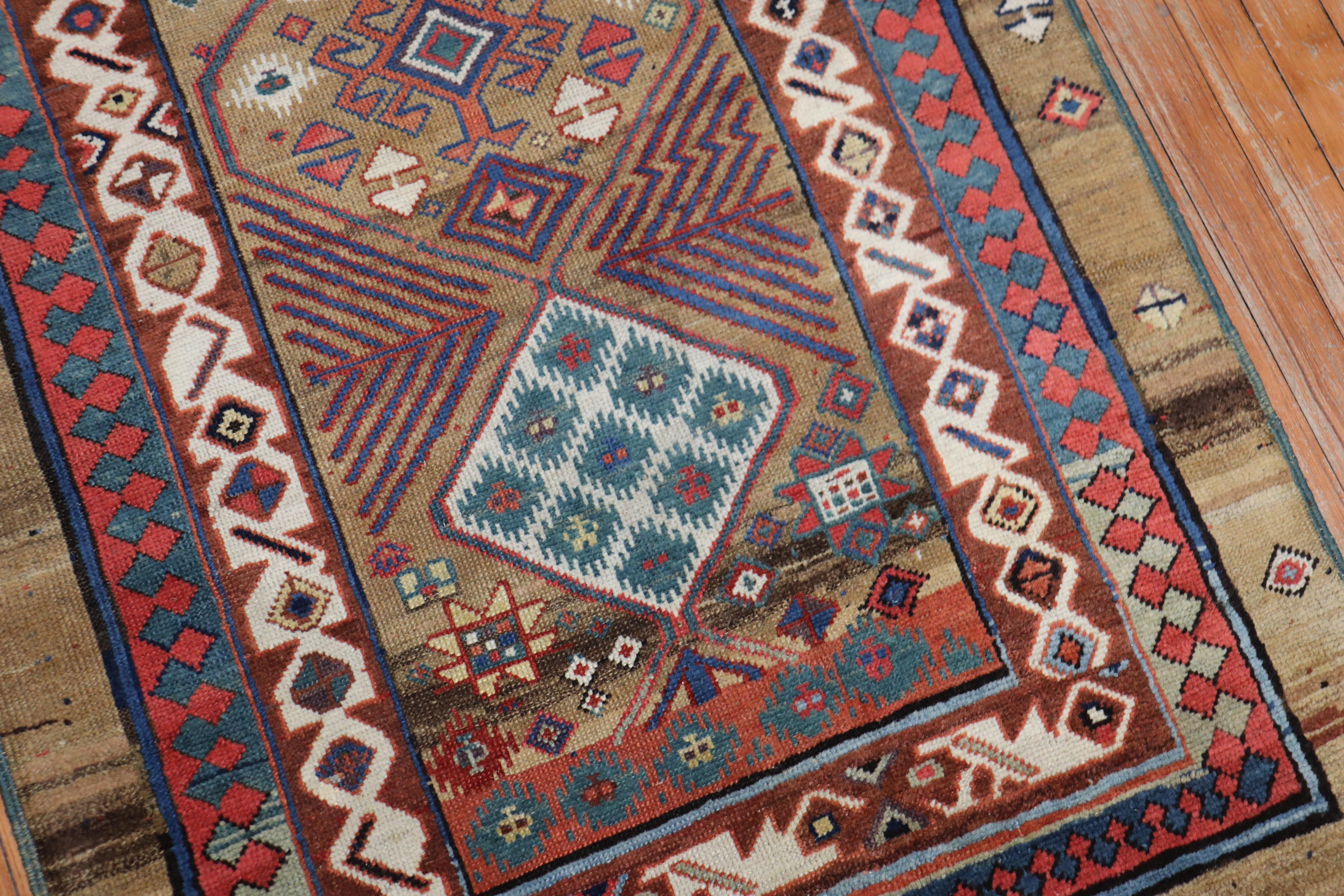Highly collectible full pile Persian Serab runner with a camel ground and geometric motif. The colors, quality, geometry, and characteristics make this a true one of a kind unique gem, circa 1890.

Measures: 3'3