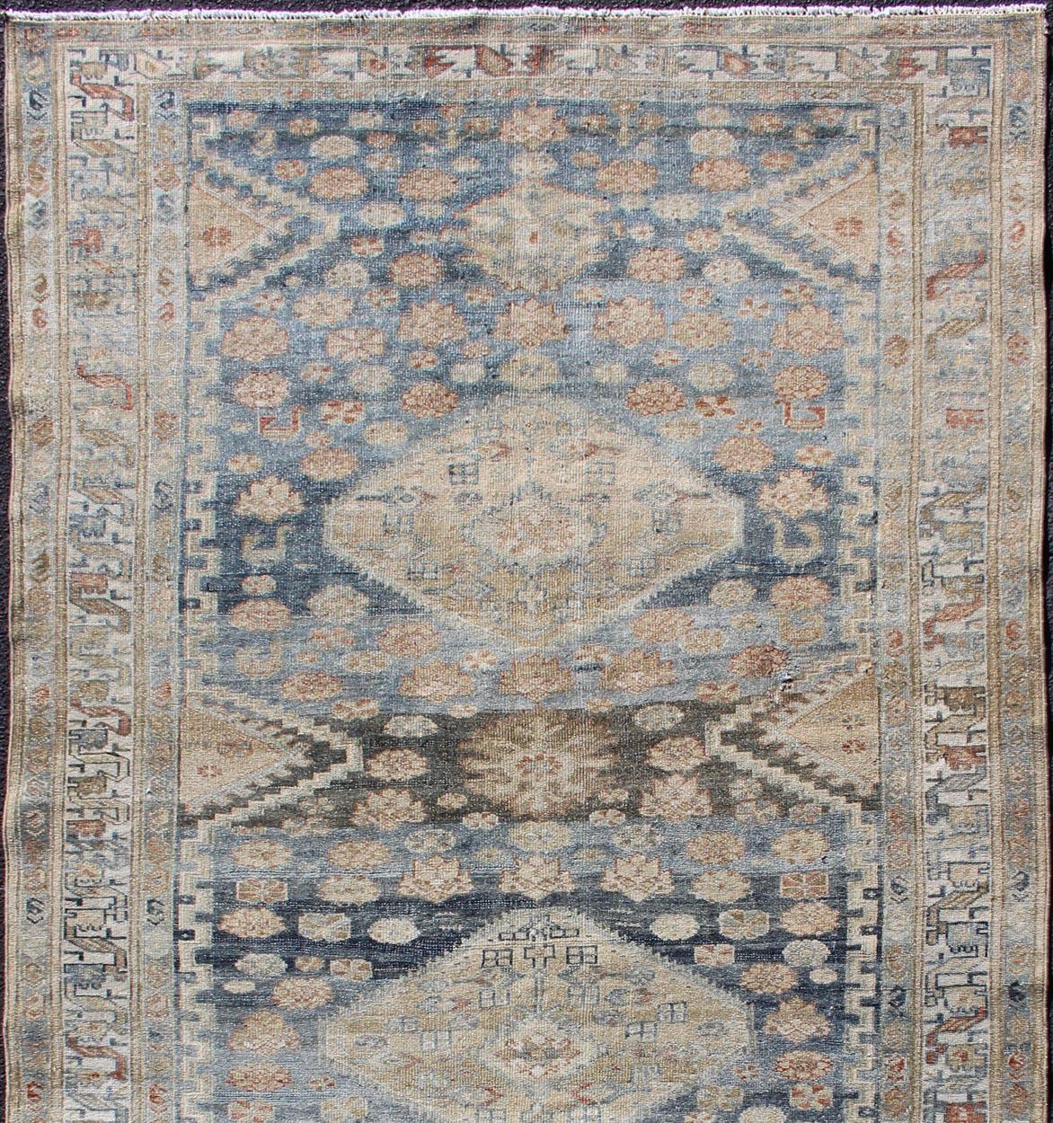 Tribal Persian Malayer rug with geometric design in dark and steel blue and tan tones,
Gray, taupe, light blue, tan and brown geometric Persian Malayer rug, rug EMA-7543 country of origin / type: Iran / Tabriz, circa 1920.

This antique Malayer