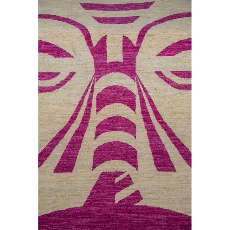 Hand Knotted Cream Geometric Wool Rug w/ Pink Tribal Face Design by Carpets CC For Sale at 1stdibs