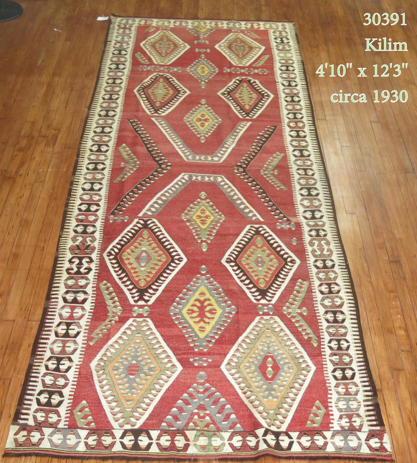 Early 20th century tribal geometric wide gallery size runner 

Measures: 4'10