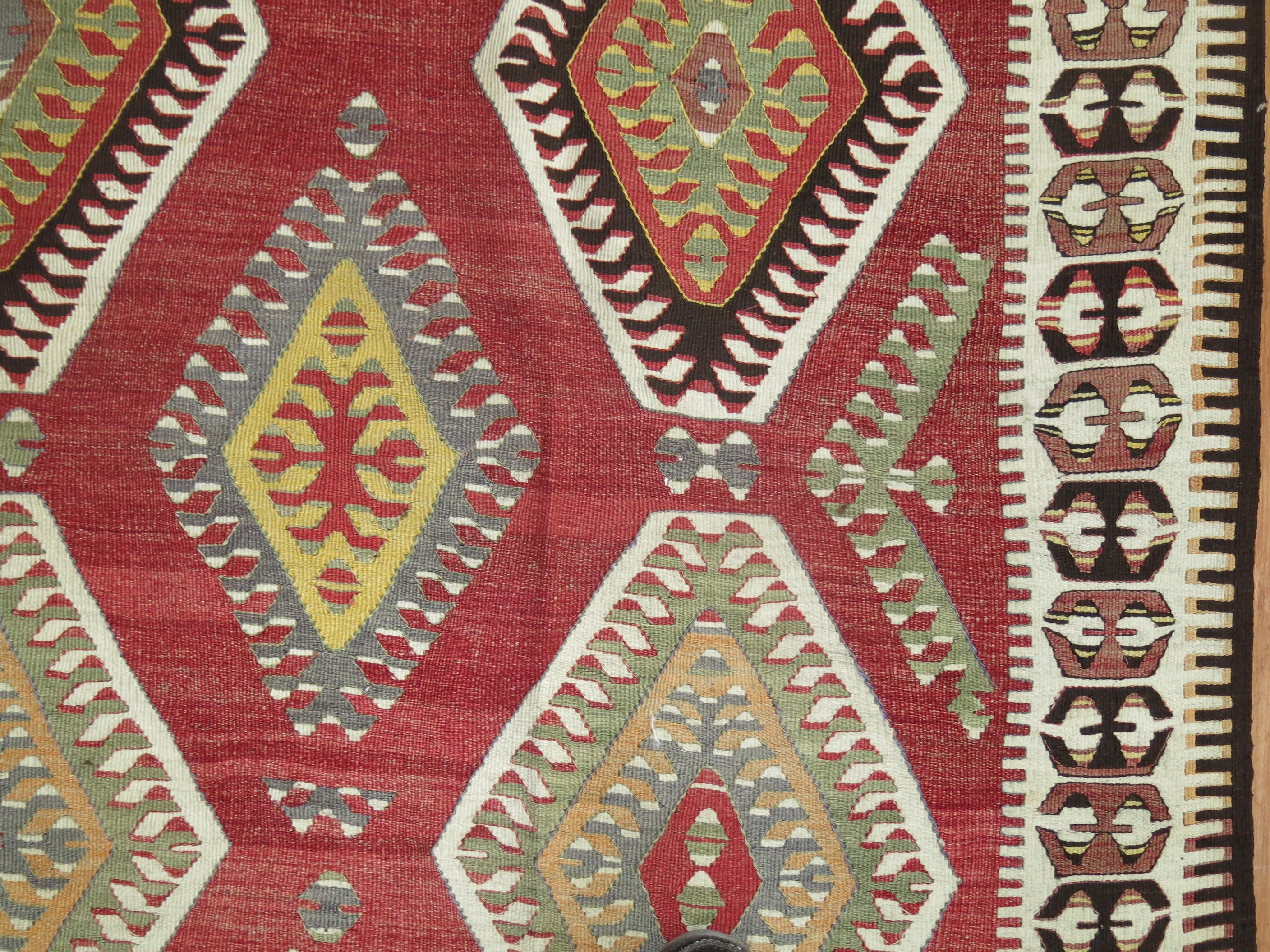 Hand-Knotted Tribal Red Turkish Gallery Kilim Runner For Sale