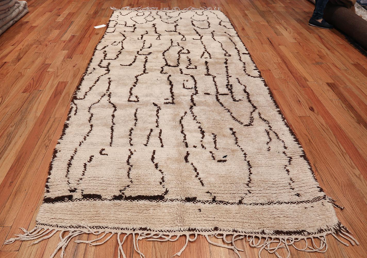 Magnificent And Primitive Brown Cream Vintage Shag Moroccan Beni Ourain Rug, Country of Origin / Rug Type: Morocco, Circa Date: Mid – 20th Century. Size: 5 ft x 10 ft 9 in (1.52 m x 3.28 m)

The neutral cream background and earthy brown toned