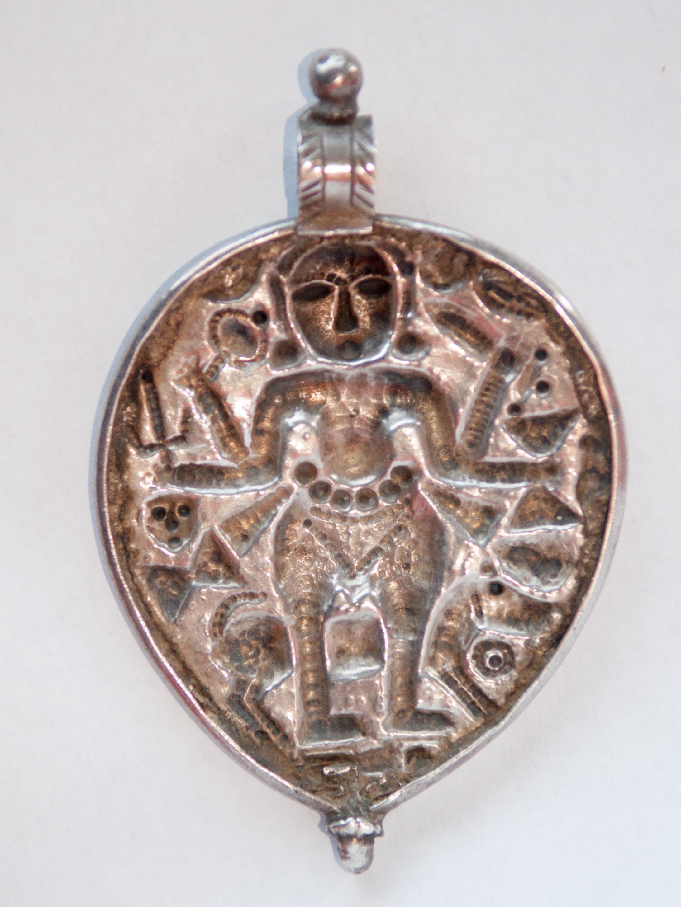 Tribal Silver Pendant from India Depicting Kali, Repousse Work, Mid-20th Century 6