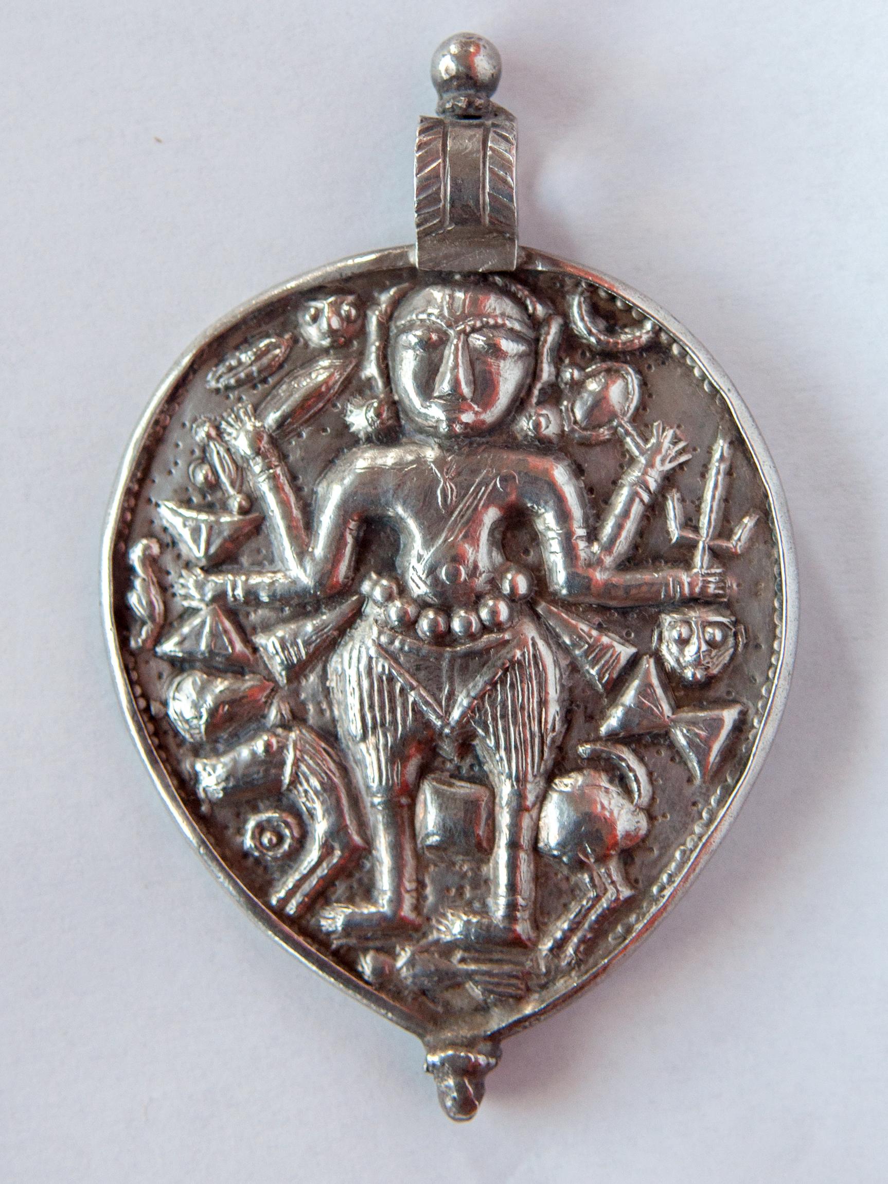 Tribal Silver Pendant from India Depicting Kali, Repousse Work, Mid-20th Century 7