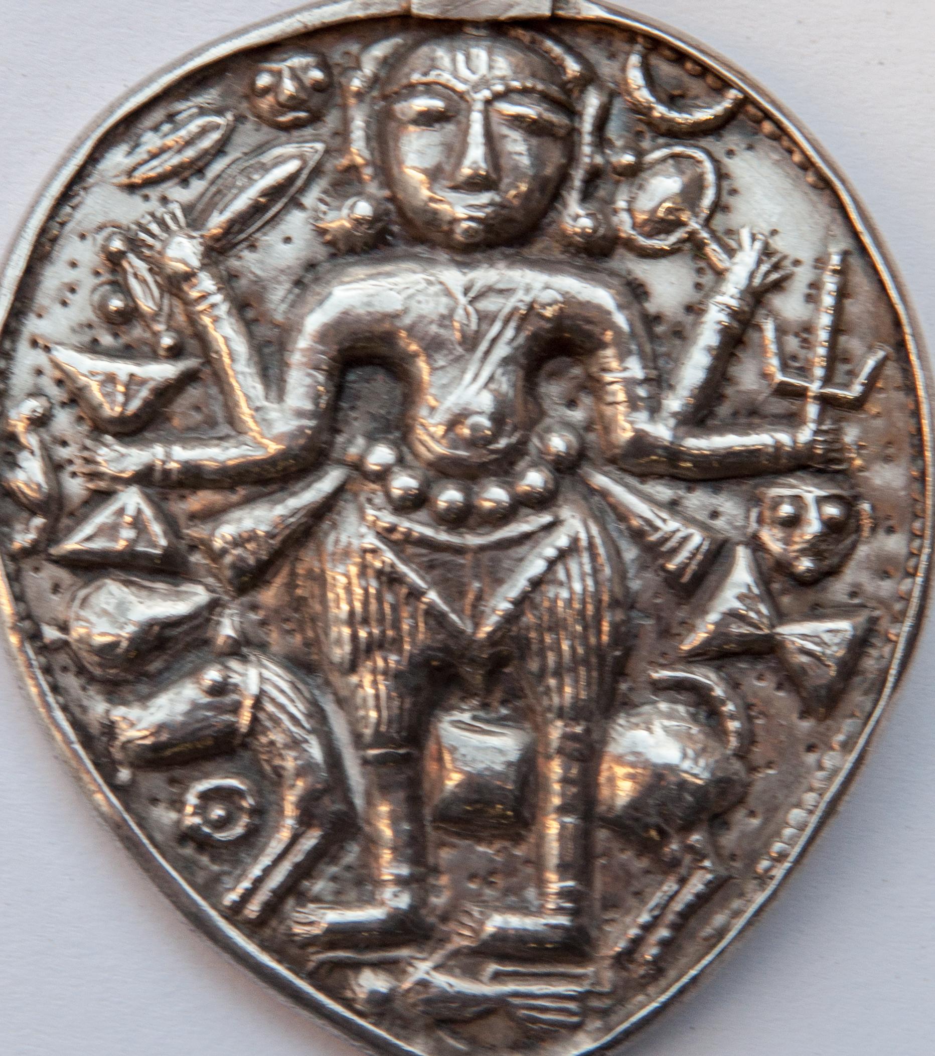 Repoussé Tribal Silver Pendant from India Depicting Kali, Repousse Work, Mid-20th Century
