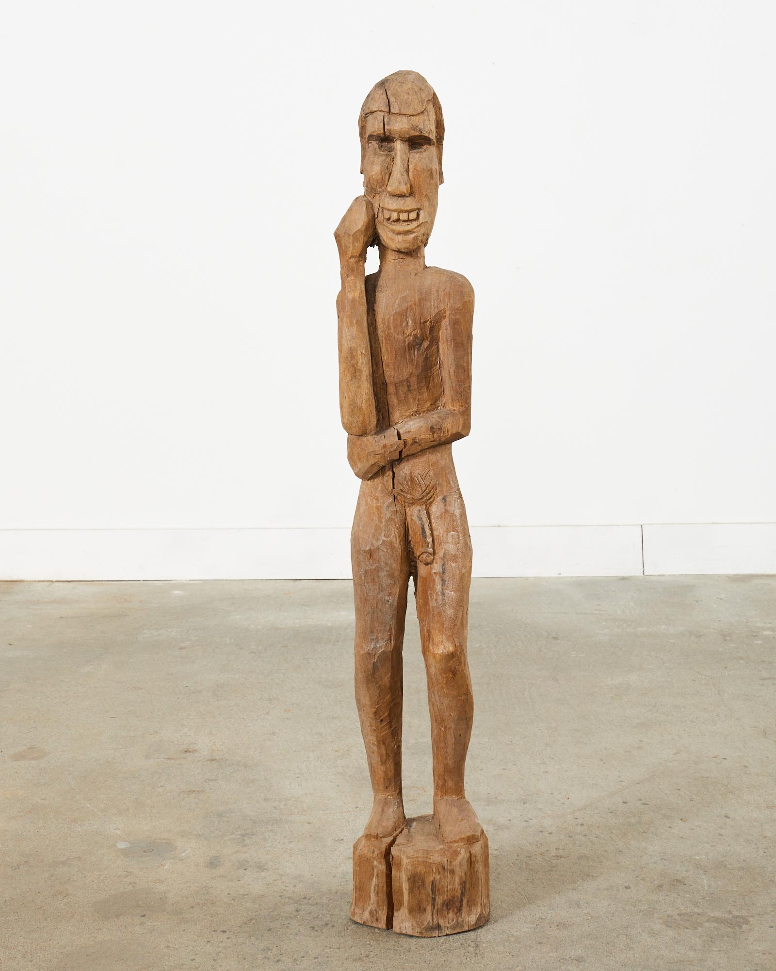 Hand-Crafted Tribal Style Carved Wood Standing Figure Sculpture For Sale