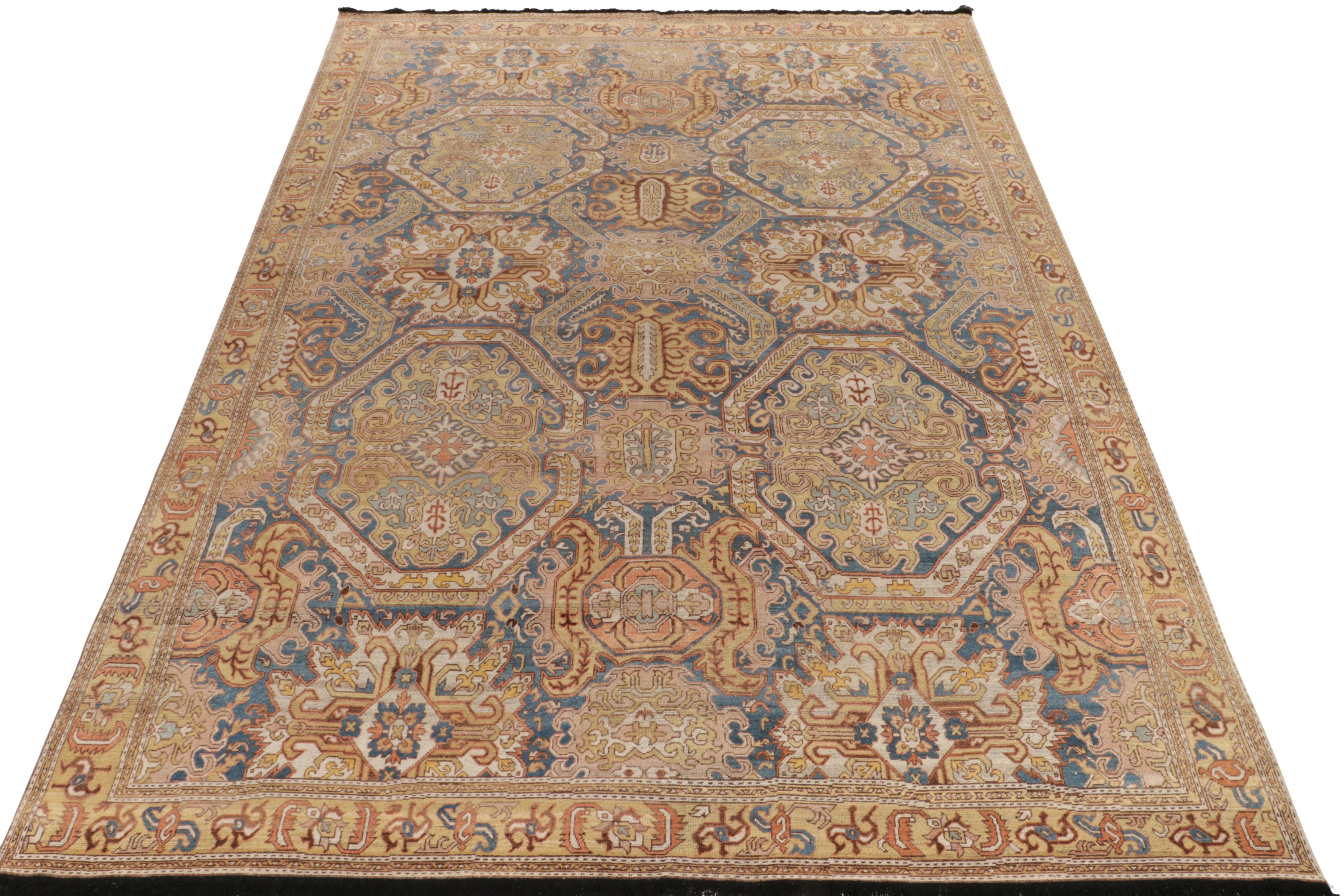 Belonging to our Burano collection, an 11 x 15 hand-knotted rug enjoying a beautiful primitivist attitude with unique colorway & graph. The tribal vision manifests with glorious geometric patterns in luxe blue, gold & white for a dramatic, rich