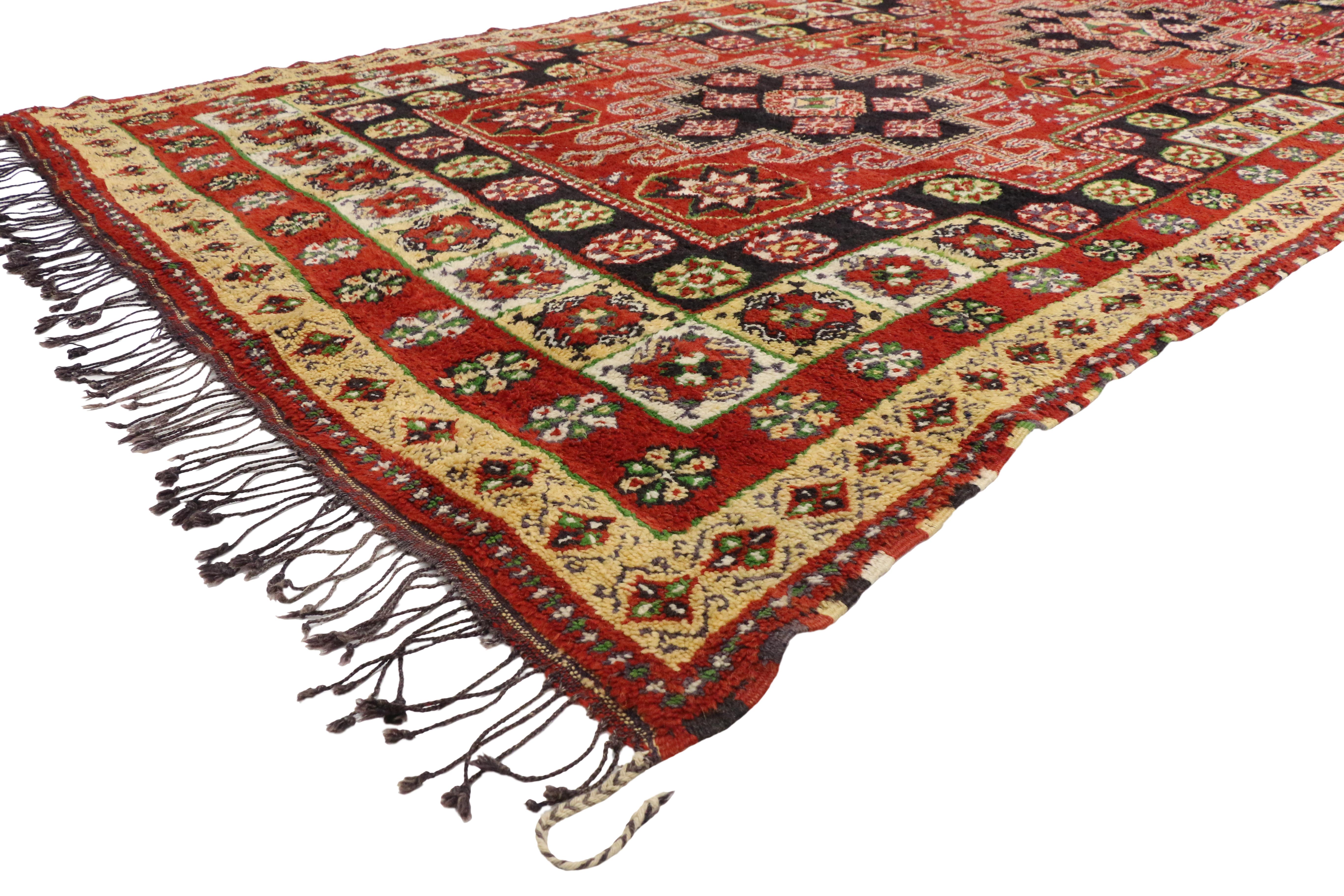 77203, tribal style vintage Rabat Moroccan area rug. Brilliant color and tribal allure collide in this stunning hand-knotted wool vintage Moroccan Rabat area rug. Two latch-hooked stepped medallions elegantly float in the center of an abrashed