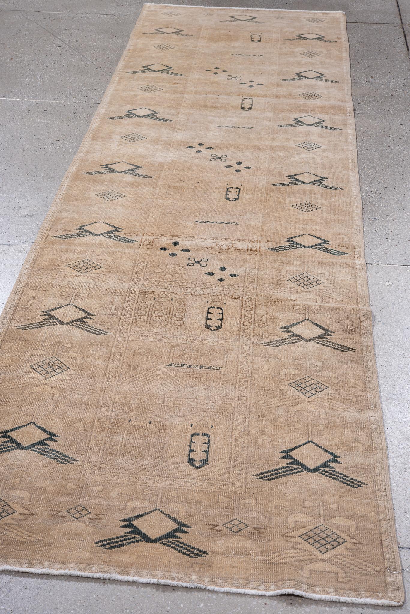 Turkish Tribal Sun Faded Oushak with Black Accents For Sale