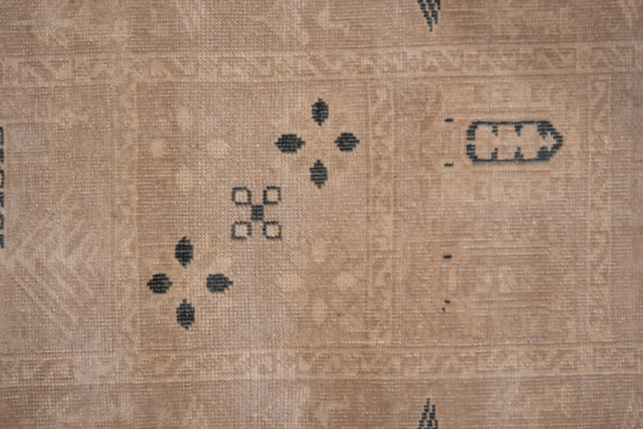 20th Century Tribal Sun Faded Oushak with Black Accents For Sale