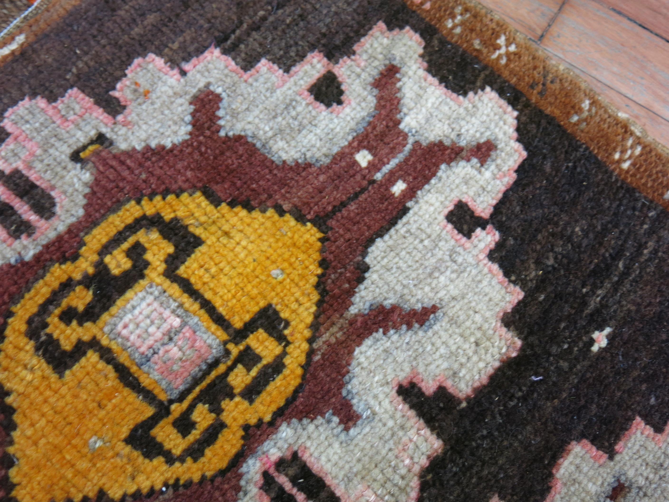 Mid 20th century Tribal Turkish rug

Measures: 2' x 2'5