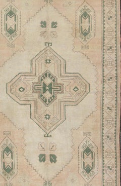 Vintage Turkish Oushak Rug in Soft Peach and Faded Sage Green With A Medallion
