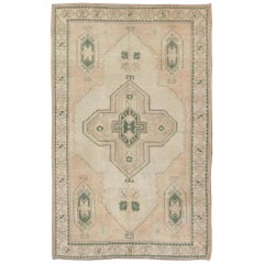 Tribal Turkish Oushak Rug in Green, Light Peach and Cream with Cross Medallion