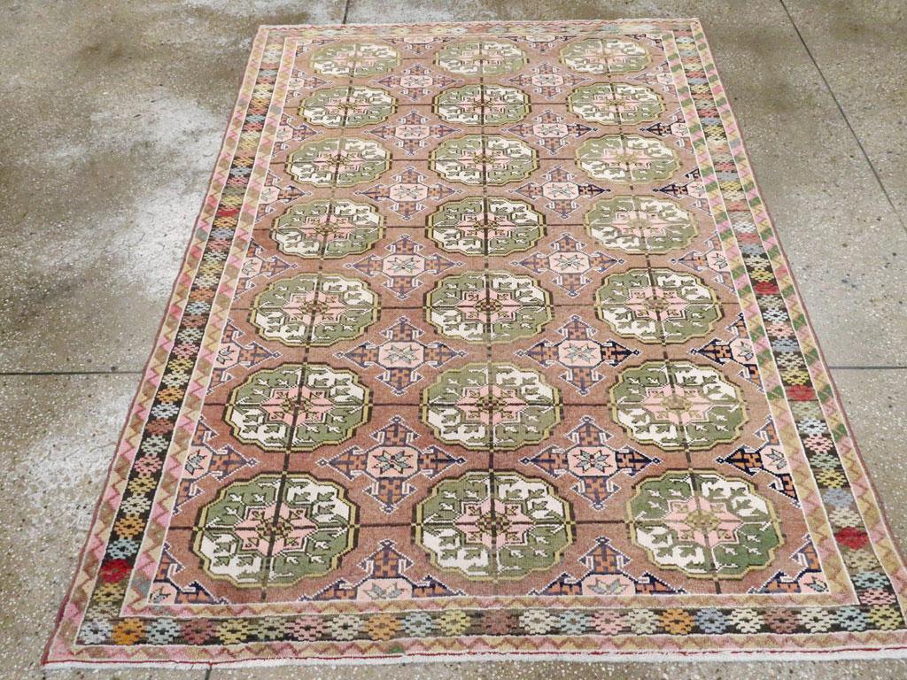 A vintage Persian Malayer accent rug handmade during the Mid-20th Century inspired by Central Asian tribal Turkoman carpets.

Measures: 4' 7
