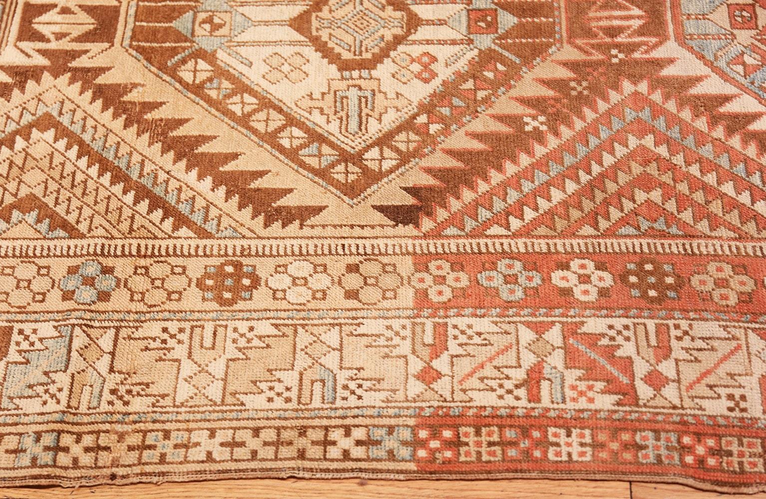Vintage Caucasian Shirvan Rug, Country of Origin: Caucasus, Circa Date: Early 20th Century. Size: 3 ft 10 in x 7 ft 4 in (1.17 m x 2.24 m)

