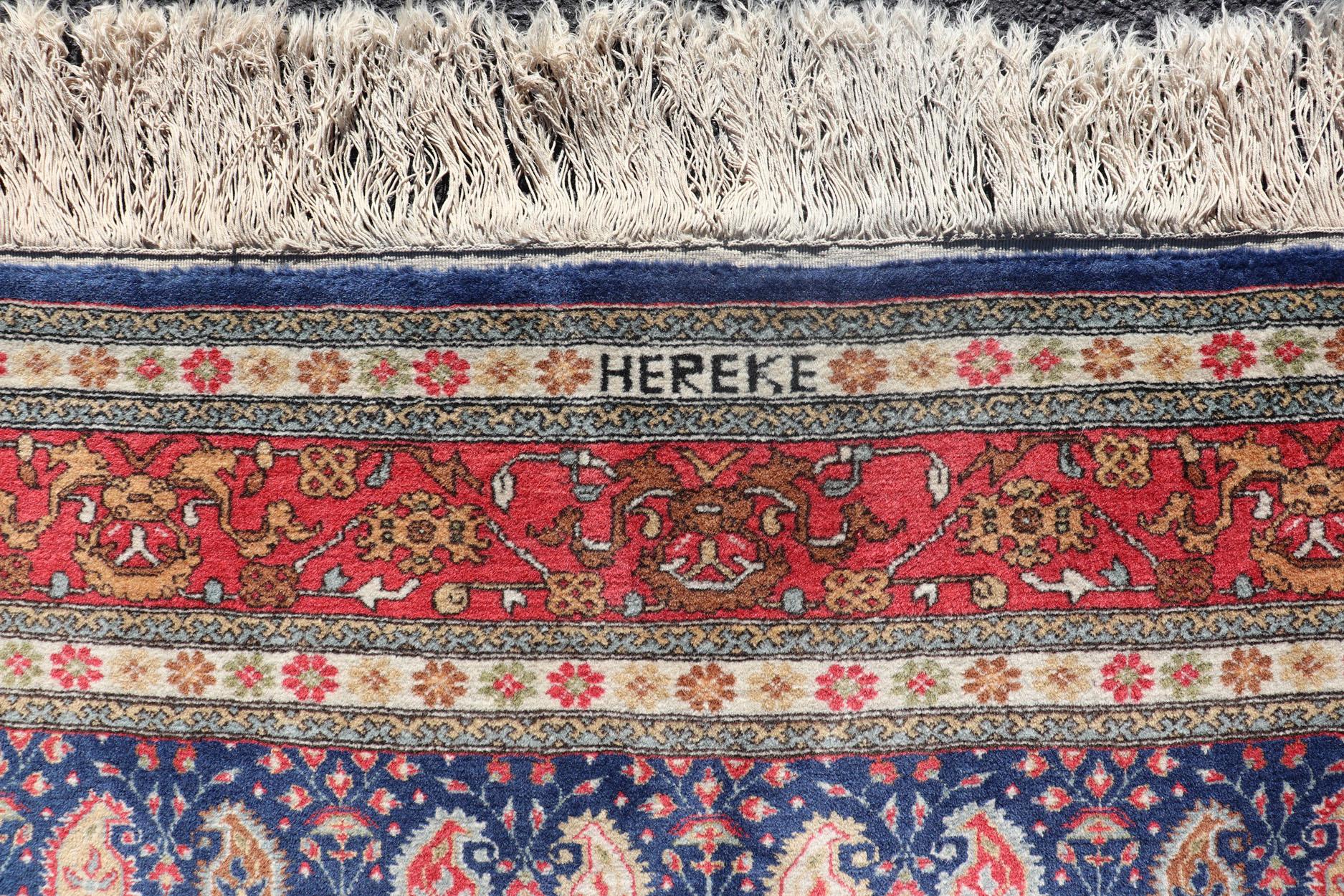 Hand-Knotted Tribal Vintage Turkey Hereke Rug in Blue, and Red