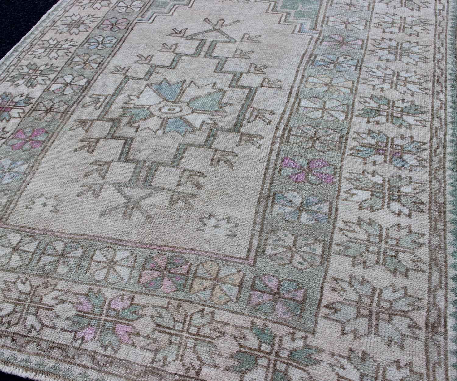 20th Century Tribal Vintage Turkish Oushak Square Rug with Medallion in Soft Green and Creams For Sale