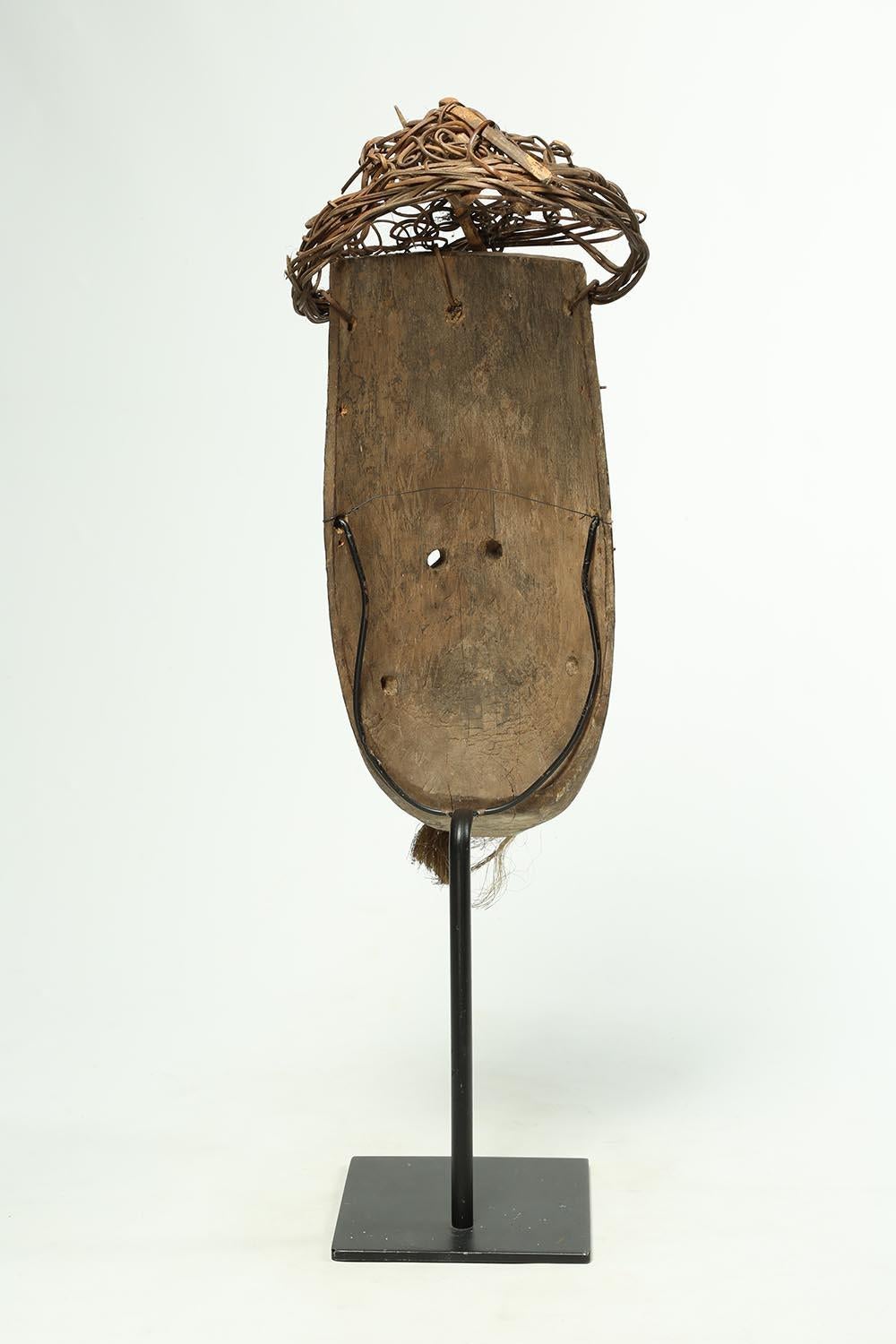 Tribal Wood and Pigment Dayak Hudoq Mask on Stand, Early 20th Century Borneo 1