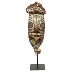 Tribal Wood and Pigment Dayak Hudoq Mask on Stand, Early 20th Century Borneo