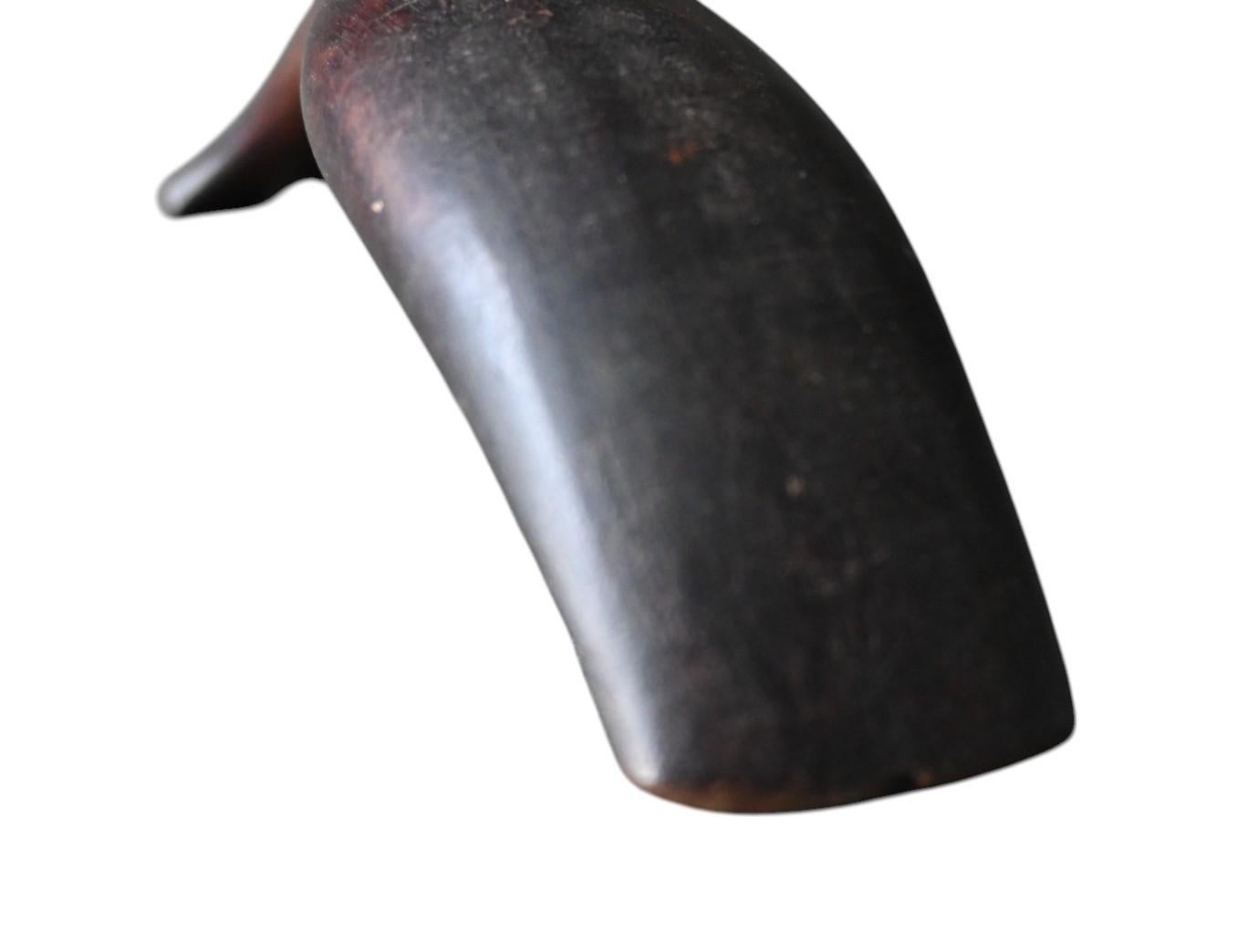 Bois Cuillère tribale en bois - Philippines, début du 20e siècle, motif de queue de baleine en vente