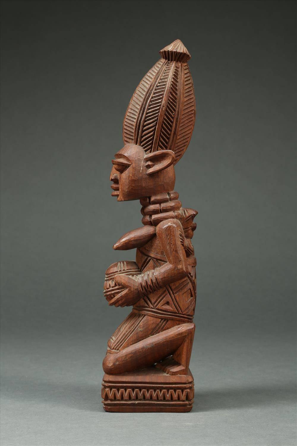 20th Century Tribal Yoruba Maternity Figure holding a Bowl, Signed J.A. Fakeye, Nigeria