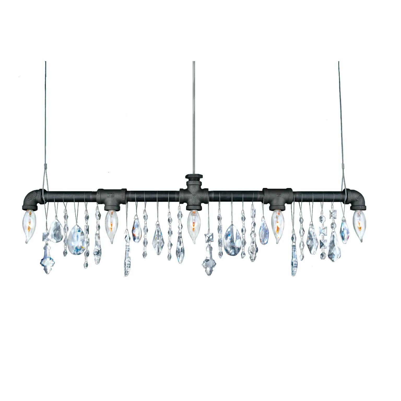 Tribeca bar chandelier linear suspension 29 by Michael McHale
Dimensions: D 3.8 x W 73.5 x H 15.2 cm.
Materials: steel, optically-pure gem-cut crystal.

5 x candelabra base CA7 bulb, either incandescent or LED.

All our lamps can be wired