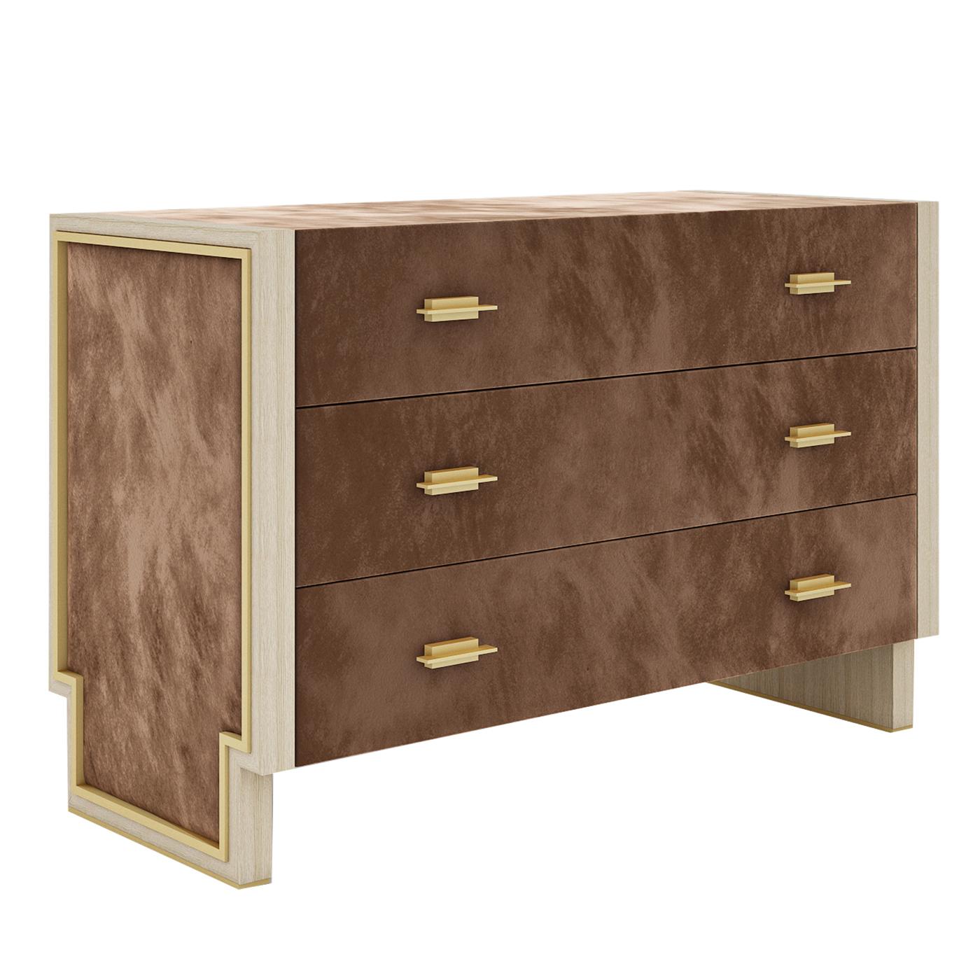 Impressive and precious, this lavish and expertly crafted dresser showcases a sturdy wooden structure upholstered by prized nubuck (or classical leather upon request). It consists of six wide drawers with handles featuring small metal details with a