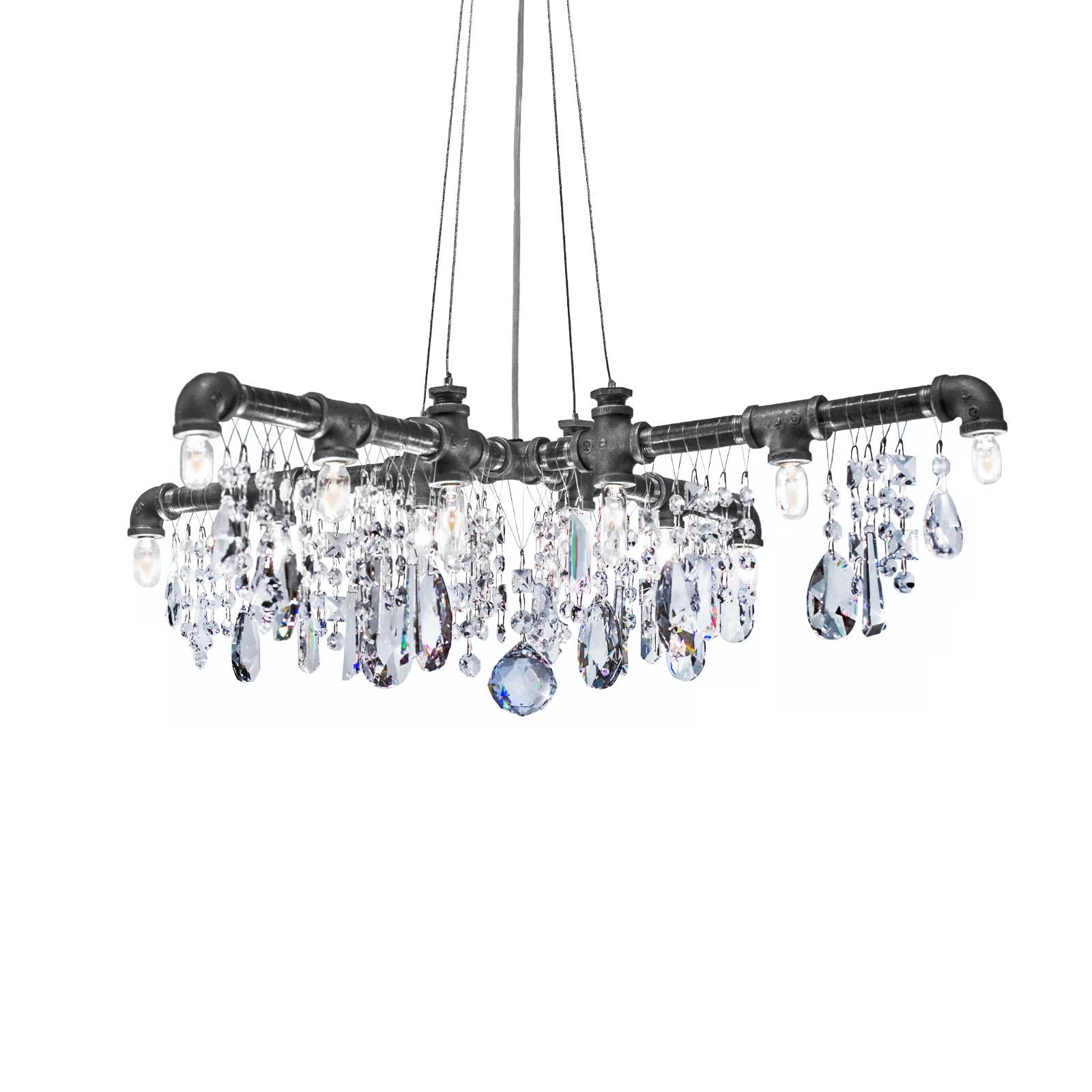 Tribeca X chandelier by Michael McHale
Dimensions: D 56 x W 56 x H 20
Materials: steel, optically-pure gem-cut crystal.

12 x candelabra base T5 bulb, either incandescent or LED

All our lamps can be wired according to each country. If sold to