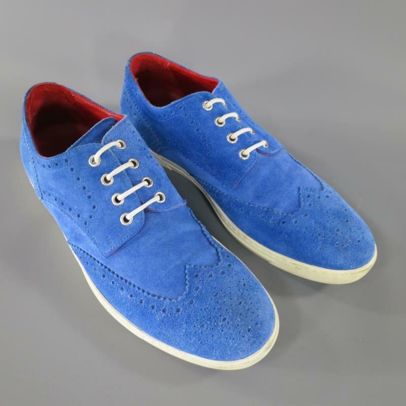 These special edition TRICKER'S by JUNYA WATENABE sneakers come in a blue suede and feature a wingtip, perforated brogue detailing throughout, and a white sole.

Good Pre-Owned Condition.