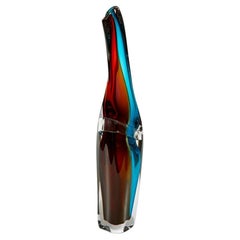 Tricolarial 56, a glass blue, red, dark amber & lime glass vase by Vic Bamforth