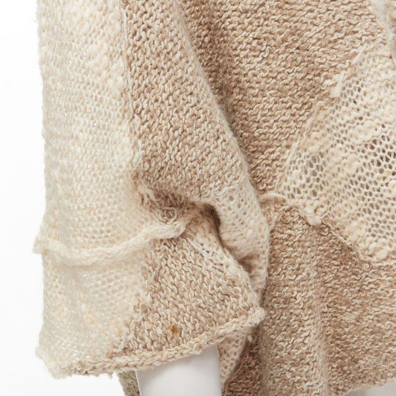 TRICOT COMME DES GARCONS 1980's Vintage Hand Made crochet knit wool sweater
Référence : CRTI/A00674
Marque : Comme Des Garcons
Designer : Rei Kawakubo
Collectional : 1980s
MATERIAL : Laine
Couleur : Beige
Fabriqué au : Japon

CONDITION :
Condition :