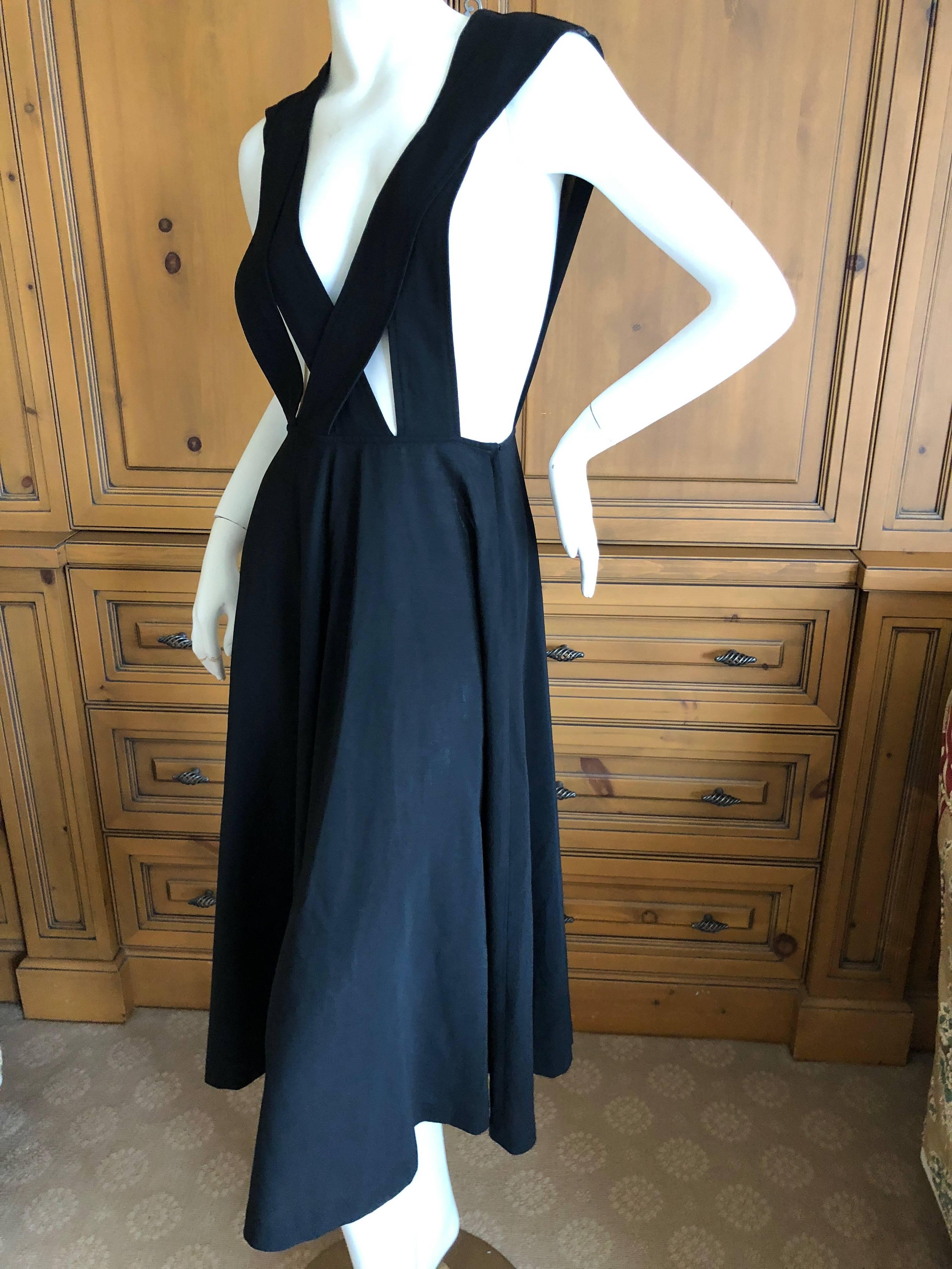 Tricot Comme des Garcons 1992 Black Bondage Dress.
Rei Kawakubo early secondary line.
100% wool.
 Size M
Bust 38