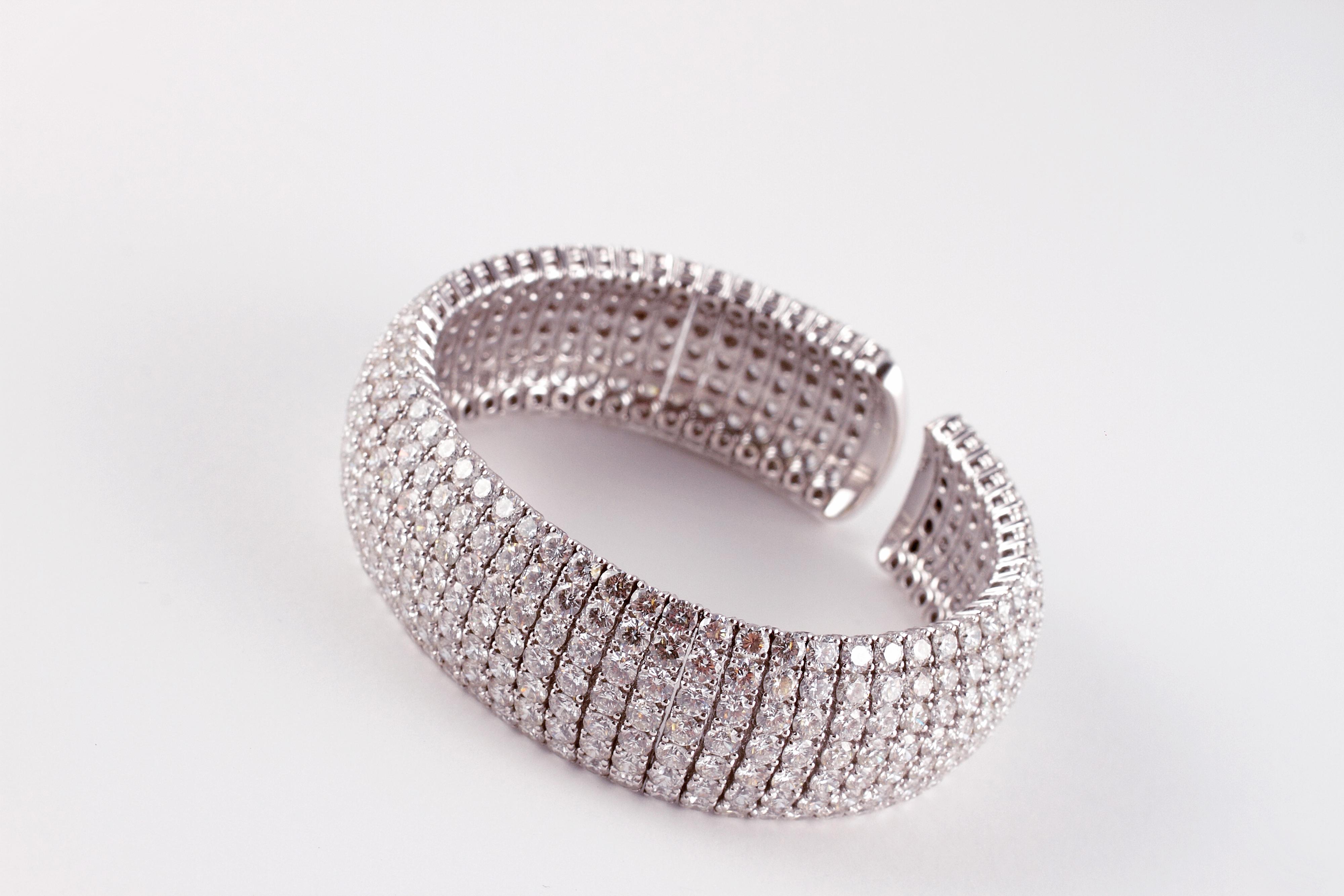 From our fabulous Estate Collection we are offering this brilliant flexible diamond cuff bracelet by Trident with 399 prong set round brilliant diamonds weighing a total of 36.93 carats and all beautifully matched of VS 1 in clarity and G color. 