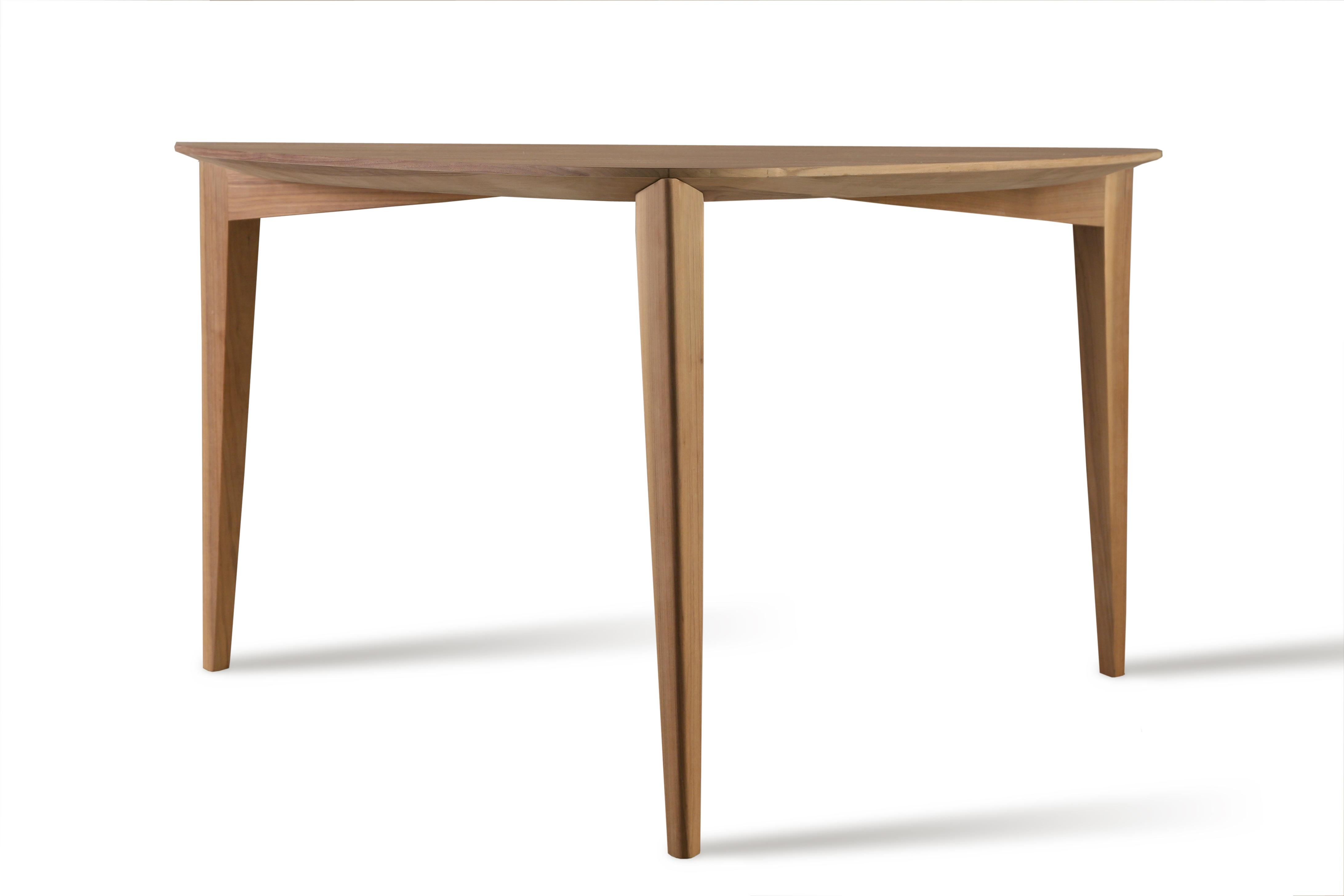 Trident, contemporary table made of ash wood or canaletto walnut with triangular top and three legs of triangular section.
made in italy by Morelato

