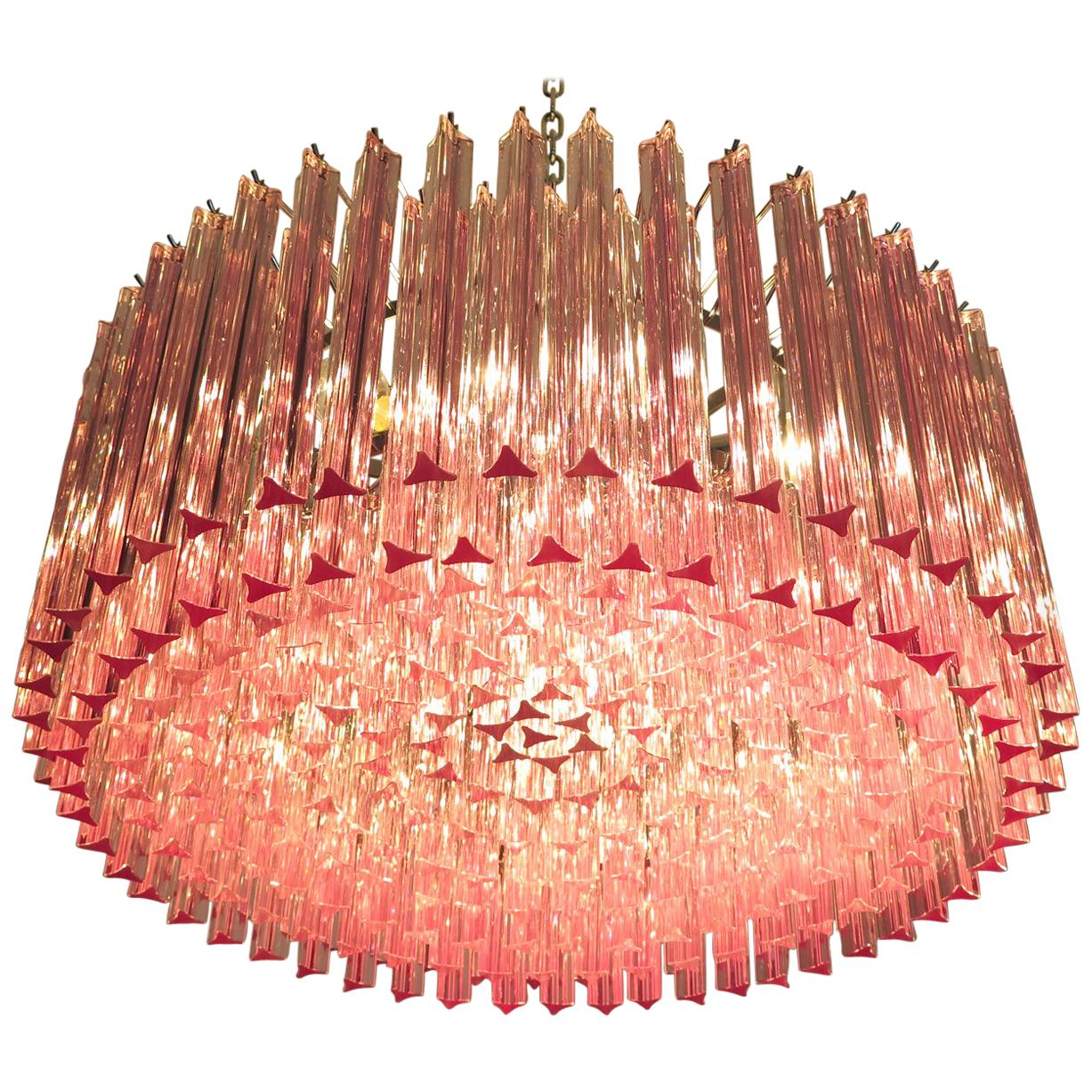 Triedri Murano glass chandelier, 265 pink prism
A magnificent Murano glass chandelier, 265 pink triedri on crome frame. This large midcentury Italian chandelier is truly a timeless Classic.
Period: late 20th century
Dimensions: 43.30 inches (110