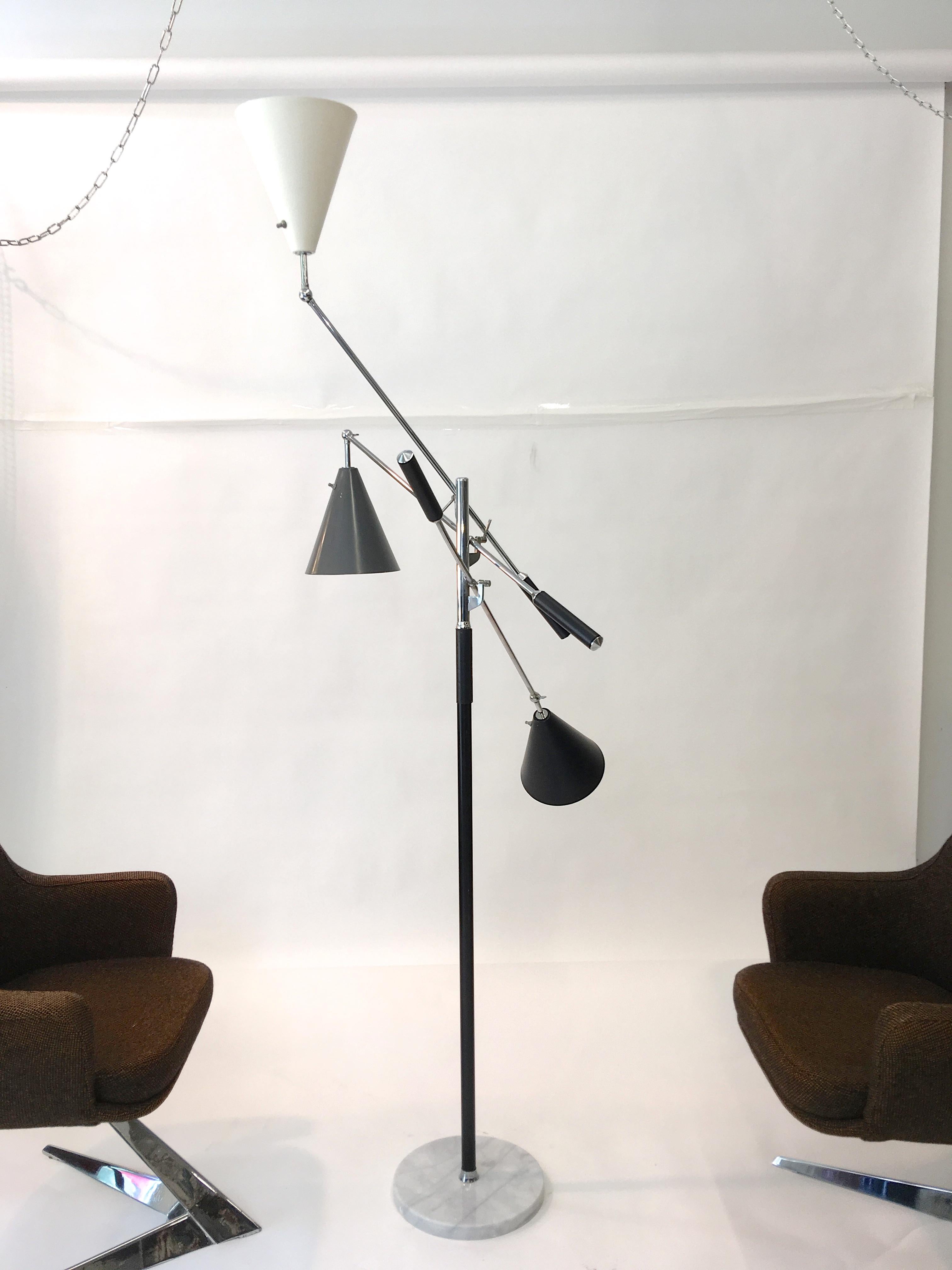 Angelo Lelii's 1951 Triennale Award winning three-arm floor lamp produced in Italy for export by Denis Casey for Casey Fantin, Firenze and imported to the USA by Koch & Lowy. Marked 'Made in Italy