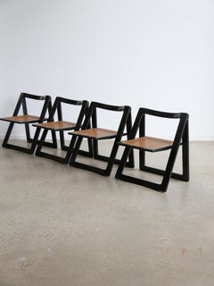 Trieste Set of Four Black Lacquered Folding Chairs by Jacob & D'aniello for Bazz