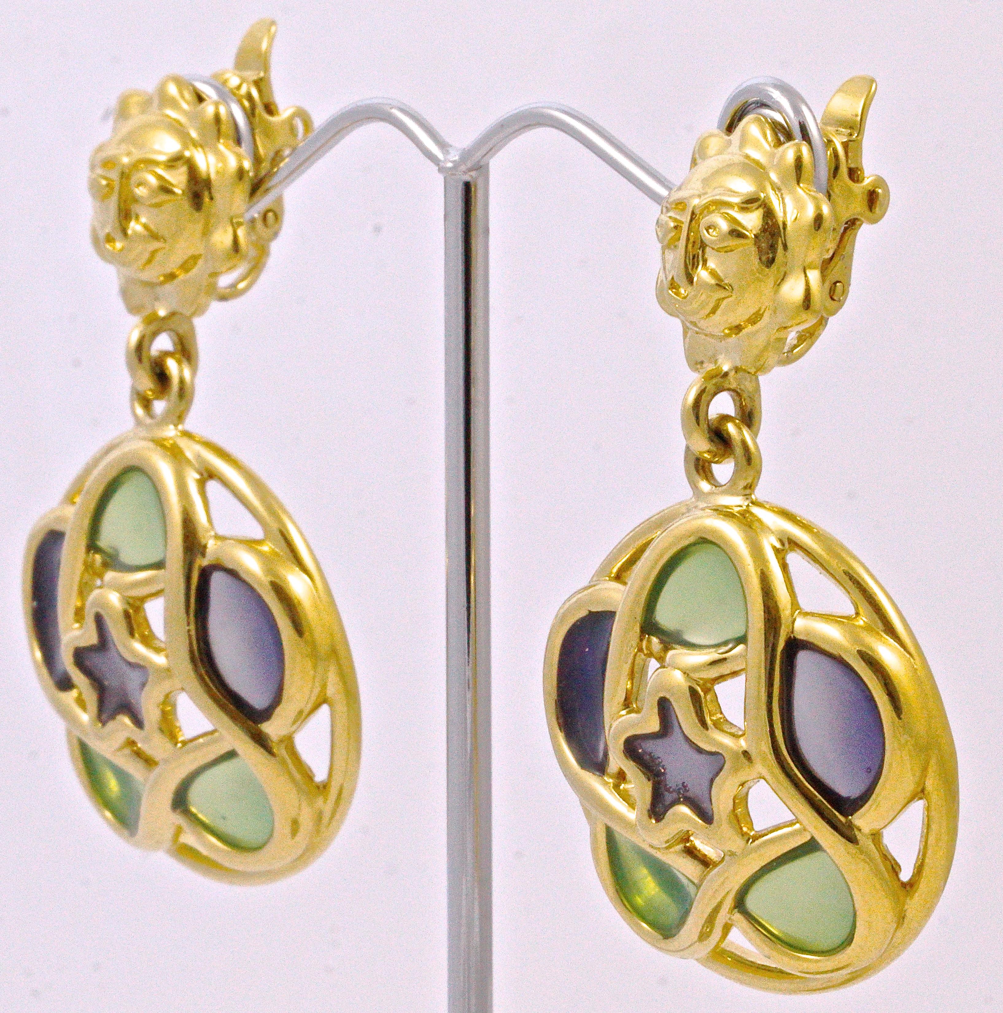 Women's or Men's Trifari 1980s Gold Plated Green and Lilac Glass Sun Face Star Clip On Earrings